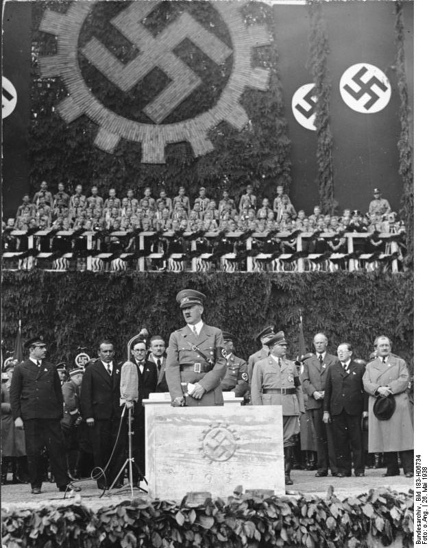 Adolf Hitler makes a speech at the presentation of the beetle